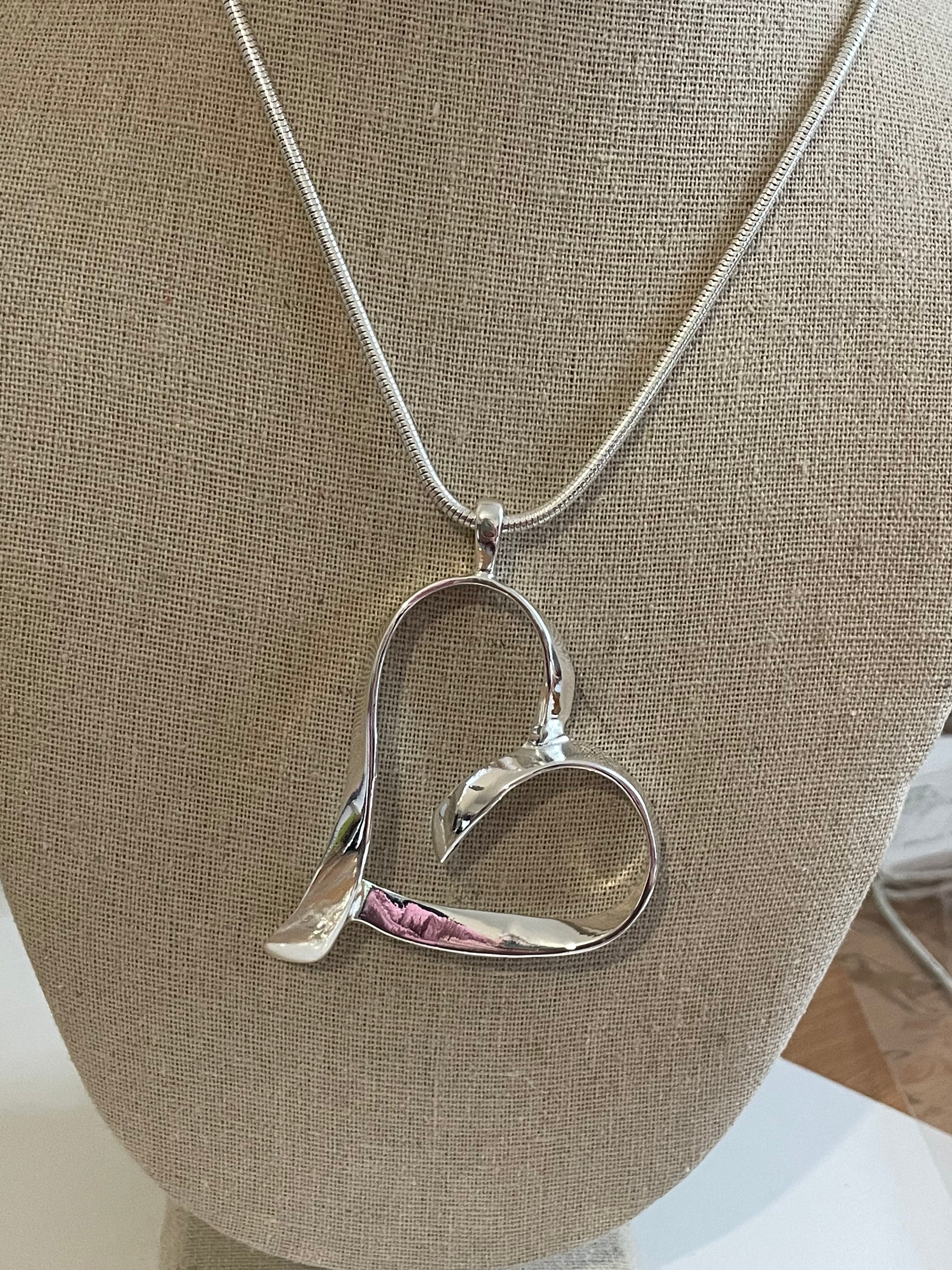 Joining hearts necklace deals