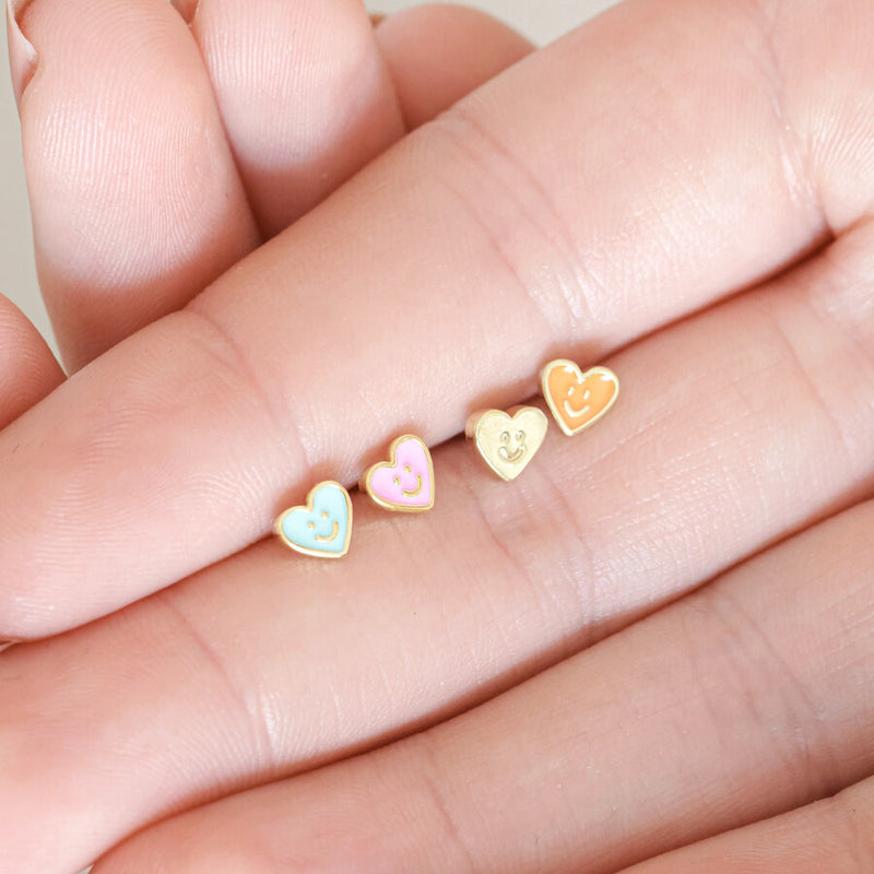 Set of Four Mismatched Heart Face Stud Earrings in Gold